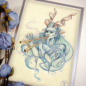 Photograph of a matted print of a graphite and colored pencil chest up portrait drawing of a male faun with blue fur and long twisting brown goat horns. The faun is facing ¾ to the left, his eyes locked on the viewer as he plays a double flute being held up with both hands. The faun has high cheekbones and a mischievous grin on his face. Long tendrils of blue hair from his head and chin beard cascade all around him, creating a border where the portrait ends at his chest. The mat-board is white on the top layer and silver on the second layer. Blue roses rest on top of the print to the left. A small silver stamp with the Terratoff icon is at the bottom right corner of the print.