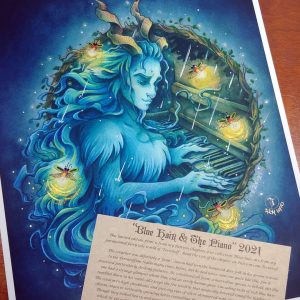 Photograph of a watercolor and gouache painting print of a blue faun playing piano in a light rain. The faun sits at a ¾ angle, with a tranquil expression while looking down at his hands playing the keys below. Fireflies fly around him and illuminate the dark blue scene. A circular hoop of branches frames the faun and piano from the waist up, leaving only a portion of the top of the piano visible. The faun appears to be leaning towards the viewer with his torso slightly exiting the frame of branches. His long blue hair and twisting goat horns protrude outside of the branch frame, creating a feeling of depth and three dimensional space. Watercolor paints and brushes are placed on top of the painting across the bottom right. The print has a ¼ inch white border and is laying on top of a wooden backdrop. The fireflies have small sparkling black crystals for eyes, and their light has been embellished with golden paint. The rain has been painted with silver paint and is catching the light brightly. A piece of parchment paper with a story printed on it lays over top of the bottom of the print.
