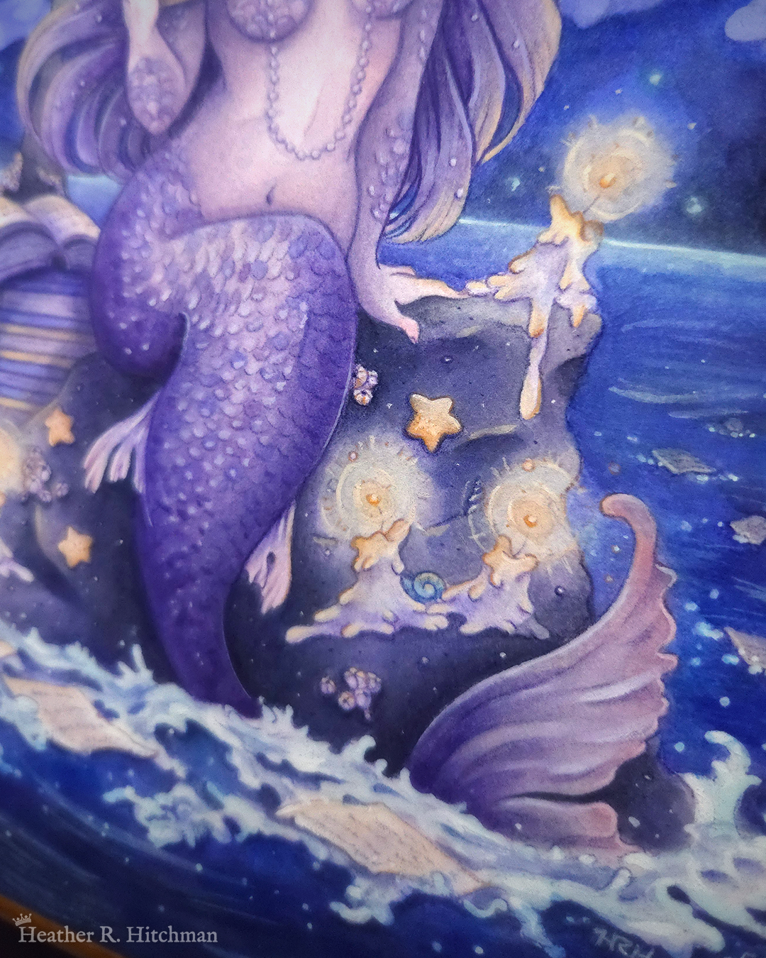 Close up of a watercolor and gouache painting of a purple mermaid reading a book under the moonlight while sitting on a gray rock in the middle of the sea. The closeup is focused on the mermaid’s tail. The rock is covered in glowing candles and also has a pile of books besides the mermaid’s tail. Gentle blue waves wash up against the rock. Loose white pages from books float in the water into the distance, leading towards a mysterious black ship that vanishes into the night.