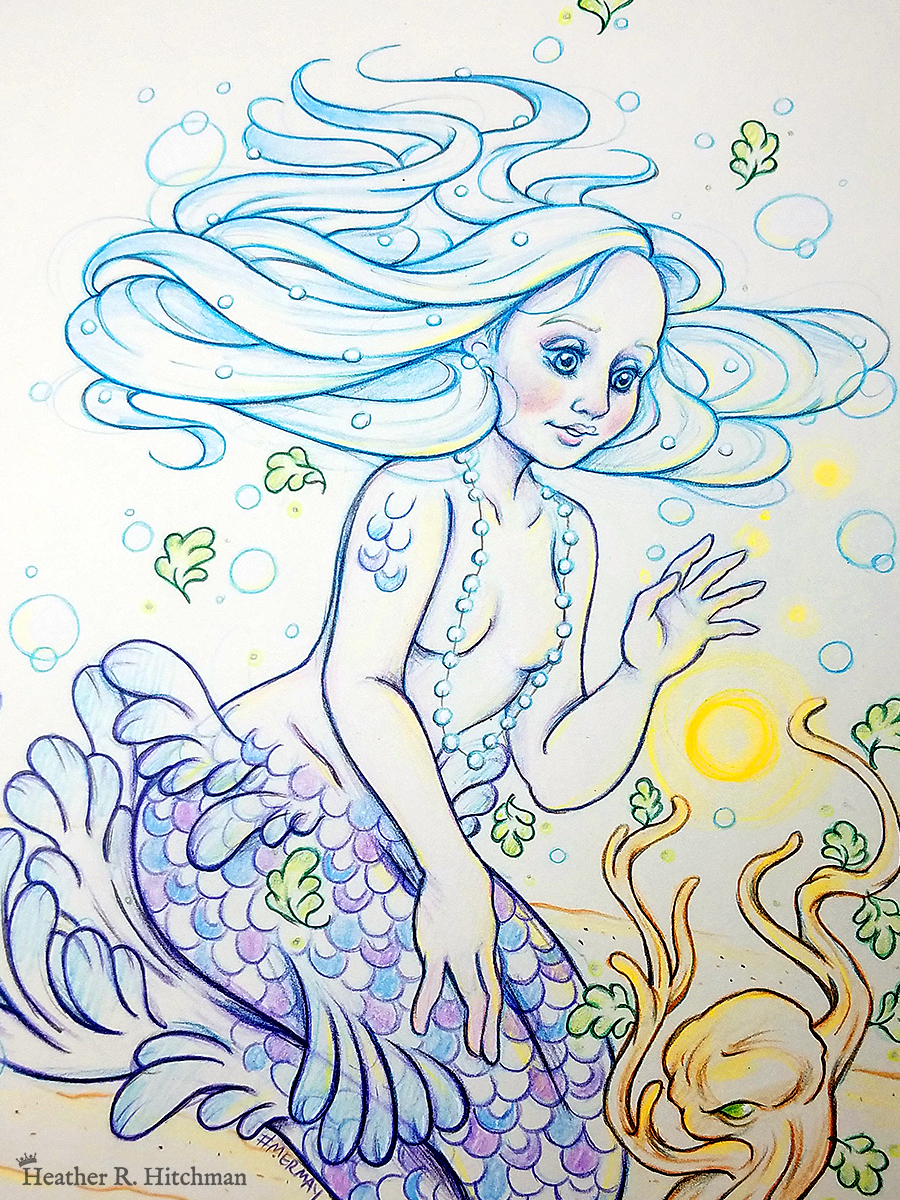 Close up process photograph of a colored pencil and graphite full body drawing of a purple and blue mermaid sitting on top of her tail in the sand at the bottom of the sea. The mermaid has light purple and blue scales on her tail and shoulders, and flowing light blue hair that is hovering around her head. She sits at a ¾ position facing to the right. A string of white pearls are worn around the mermaid’s neck that discreetly cover her bare chest. Gazing with a mystified expression towards a strange woody plant growing in the sand, she reaches forward towards a round orb of golden light hovering between herself and the plant.