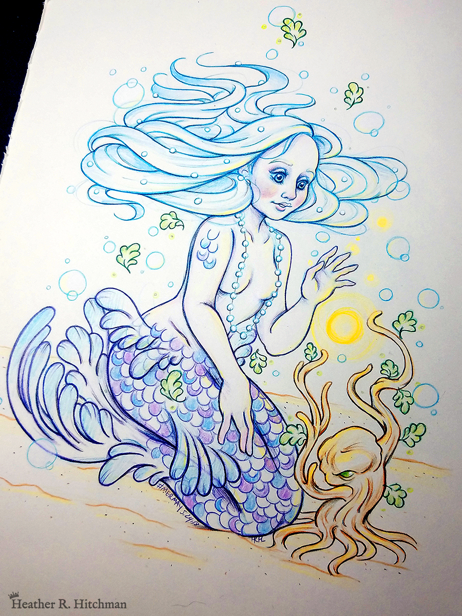 Colored pencil and graphite full body drawing of a purple and blue mermaid sitting on top of her tail in the sand at the bottom of the sea. The mermaid has light purple and blue scales on her tail and shoulders, and flowing light blue hair that is hovering around her head. She sits at a ¾ position facing to the right. A string of white pearls are worn around the mermaid’s neck that discreetly cover her bare chest. Gazing with a mystified expression towards a strange woody plant growing in the sand, she reaches forward towards a round orb of golden light hovering between herself and the plant.