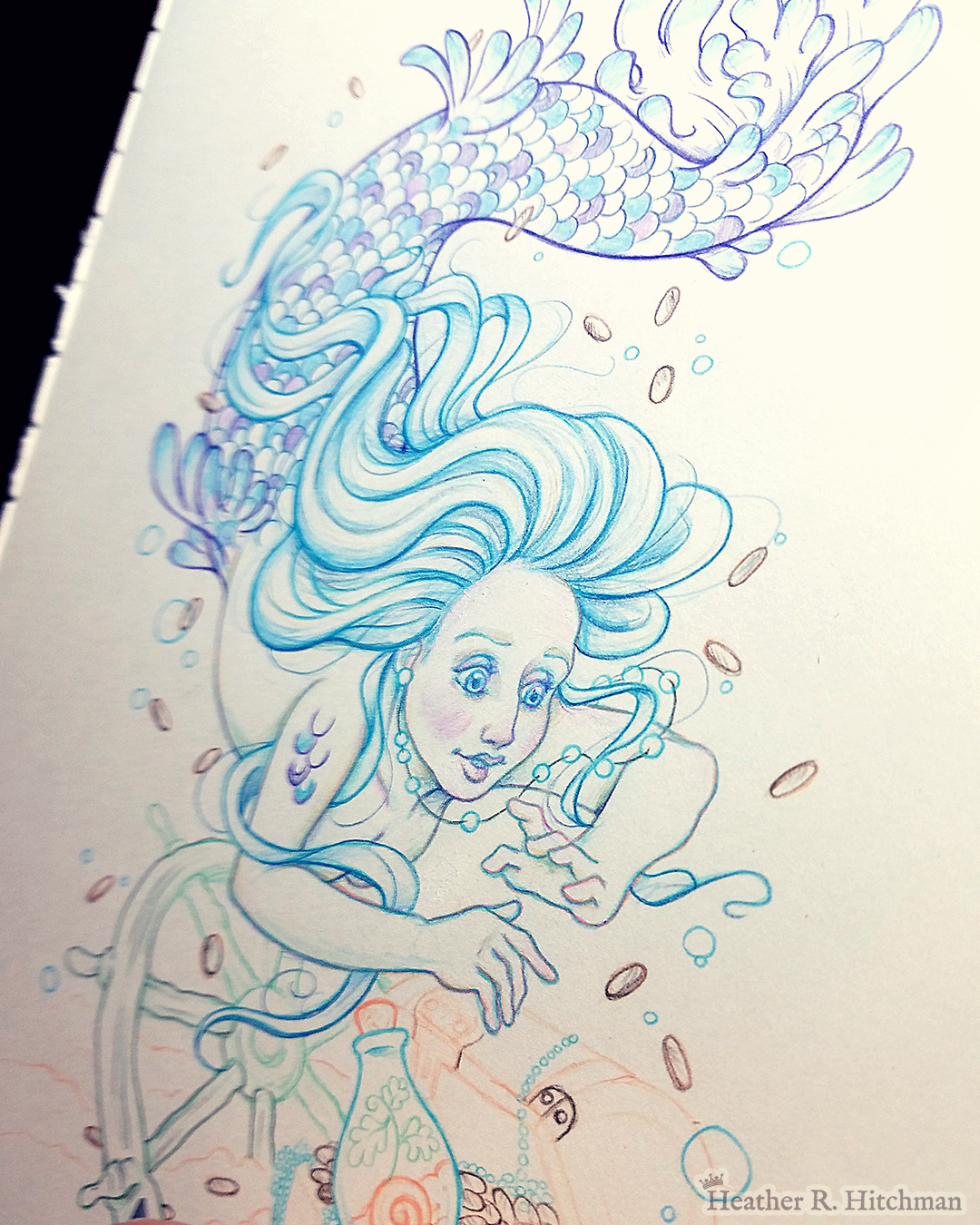 Blue Mermaid swimming underwater in the sea searching for a treasure chest