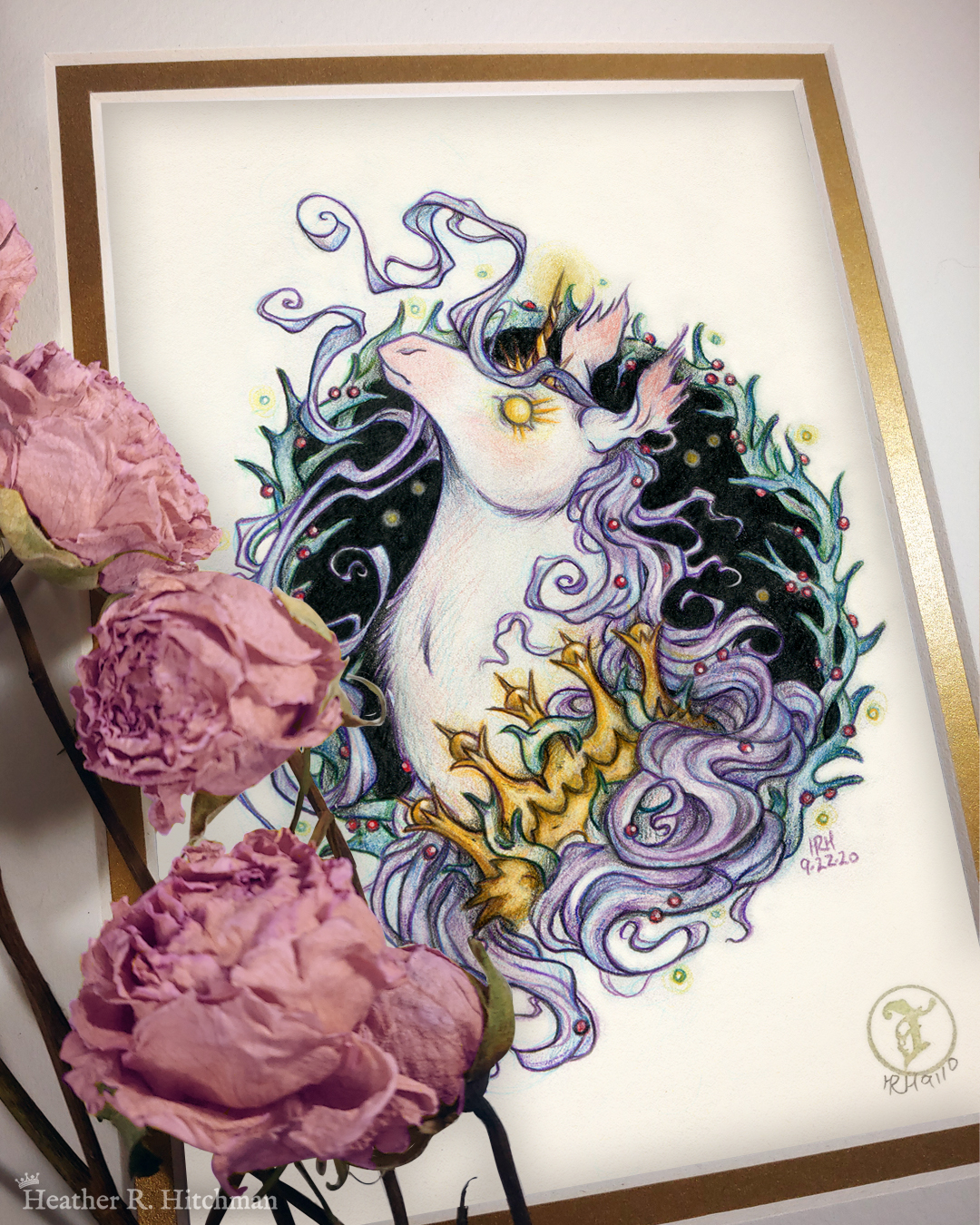Photograph of a matted print of a graphite and colored pencil portrait drawing of a corrupted rotten unicorn with pinkish white fur and a flowing purple mane, framed in a circular wreath of thorns growing small red berries. The background inside of the wreath behind the unicorn is black with tiny orbs of golden light floating around. Outside of the wreath the portrait has a sepia background color. The unicorn is throwing up her head in profile facing to the left with a stern expression. Her golden eye has long sharp golden lashes, and gazes towards the viewer. She has a short broken golden horn in the center of her forehead. The unicorn wears a thorny golden crown around her neck. The mat-board is white on the top layer and gold on the second layer. Pink roses rest on top of the print to the left. A small gold stamp with the Terratoff icon is at the bottom right corner of the print.
