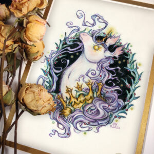 Photograph of a matted print of a graphite and colored pencil portrait drawing of a corrupted rotten unicorn with pinkish white fur and a flowing purple mane, framed in a circular wreath of thorns growing small red berries. The background inside of the wreath behind the unicorn is black with tiny orbs of golden light floating around. Outside of the wreath the portrait has a sepia background color. The unicorn is throwing up her head in profile facing to the left with a stern expression. Her golden eye has long sharp golden lashes, and gazes towards the viewer. She has a short broken golden horn in the center of her forehead. The unicorn wears a thorny golden crown around her neck. The mat-board is white on the top layer and gold on the second layer. Yellow roses rest on top of the print to the left. A small gold stamp with the Terratoff icon is at the bottom right corner of the print.