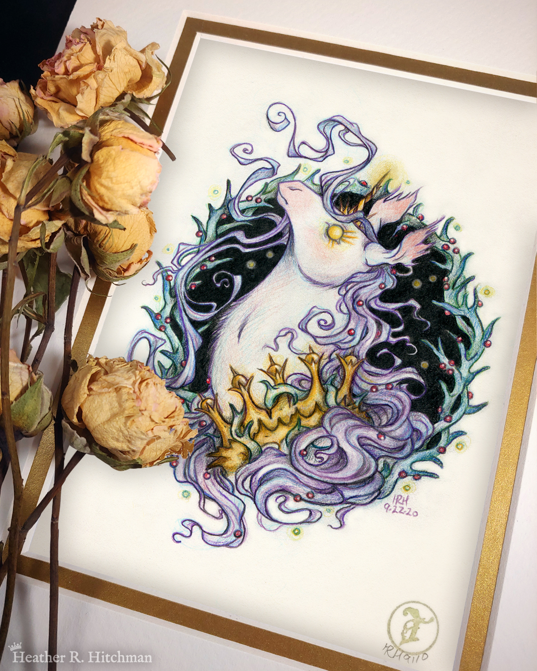 Photograph of a matted print of a graphite and colored pencil portrait drawing of a corrupted rotten unicorn with pinkish white fur and a flowing purple mane, framed in a circular wreath of thorns growing small red berries. The background inside of the wreath behind the unicorn is black with tiny orbs of golden light floating around. Outside of the wreath the portrait has a sepia background color. The unicorn is throwing up her head in profile facing to the left with a stern expression. Her golden eye has long sharp golden lashes, and gazes towards the viewer. She has a short broken golden horn in the center of her forehead. The unicorn wears a thorny golden crown around her neck. The mat-board is white on the top layer and gold on the second layer. Yellow roses rest on top of the print to the left. A small gold stamp with the Terratoff icon is at the bottom right corner of the print.